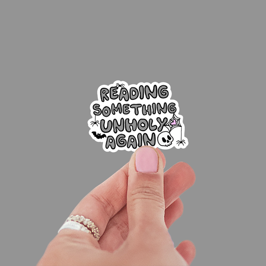 Reading Something Unholy Again Sticker